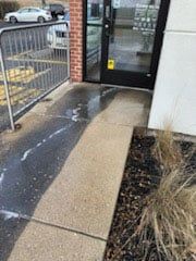 sidewalk before and after power washing