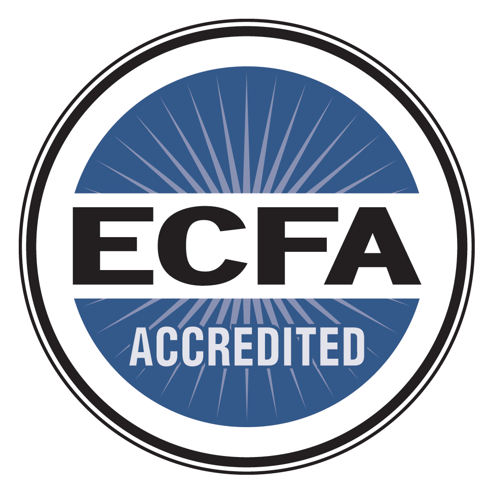 A circular ECFA Accredited seal with bold black letters and white text on a blue sunburst background inside a ring border.