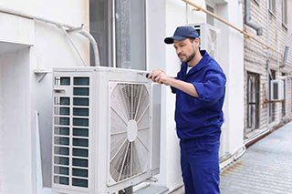 Repairing Air conditioner — Standout Electrical  In Mackay, QLD