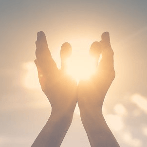 Sunlight between hands