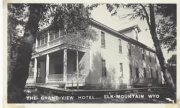 A black and white photo of the grand view hotel in clk mountain wyo