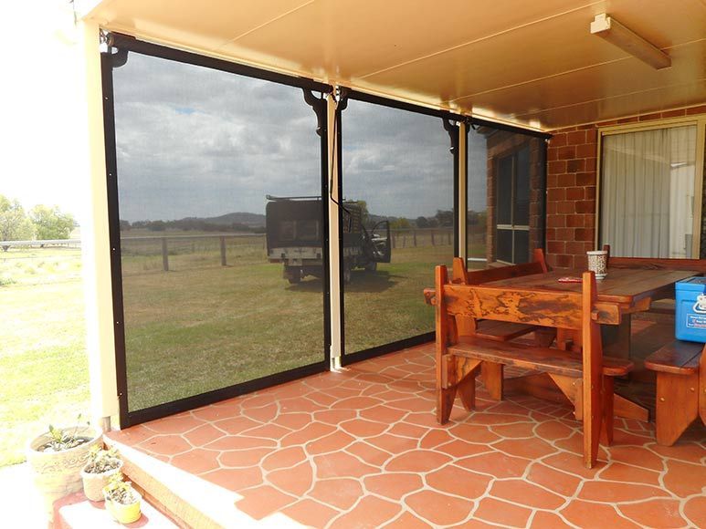 Outdoor Patio With Drop-down Sun Screens — Toowoomba Shade & Canvas in Harristown, QLD