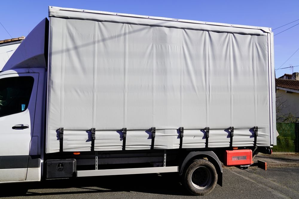 White Box Truck With Gray Canvas Side; Parked on Street — Toowoomba Shade & Canvas in Harristown, QLD