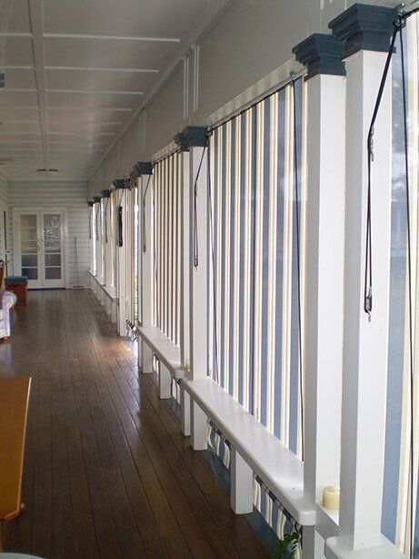 Covered Porch With White Columns and Blue-topped Pillars ā Toowoomba Shade & Canvas in Harristown, QLD