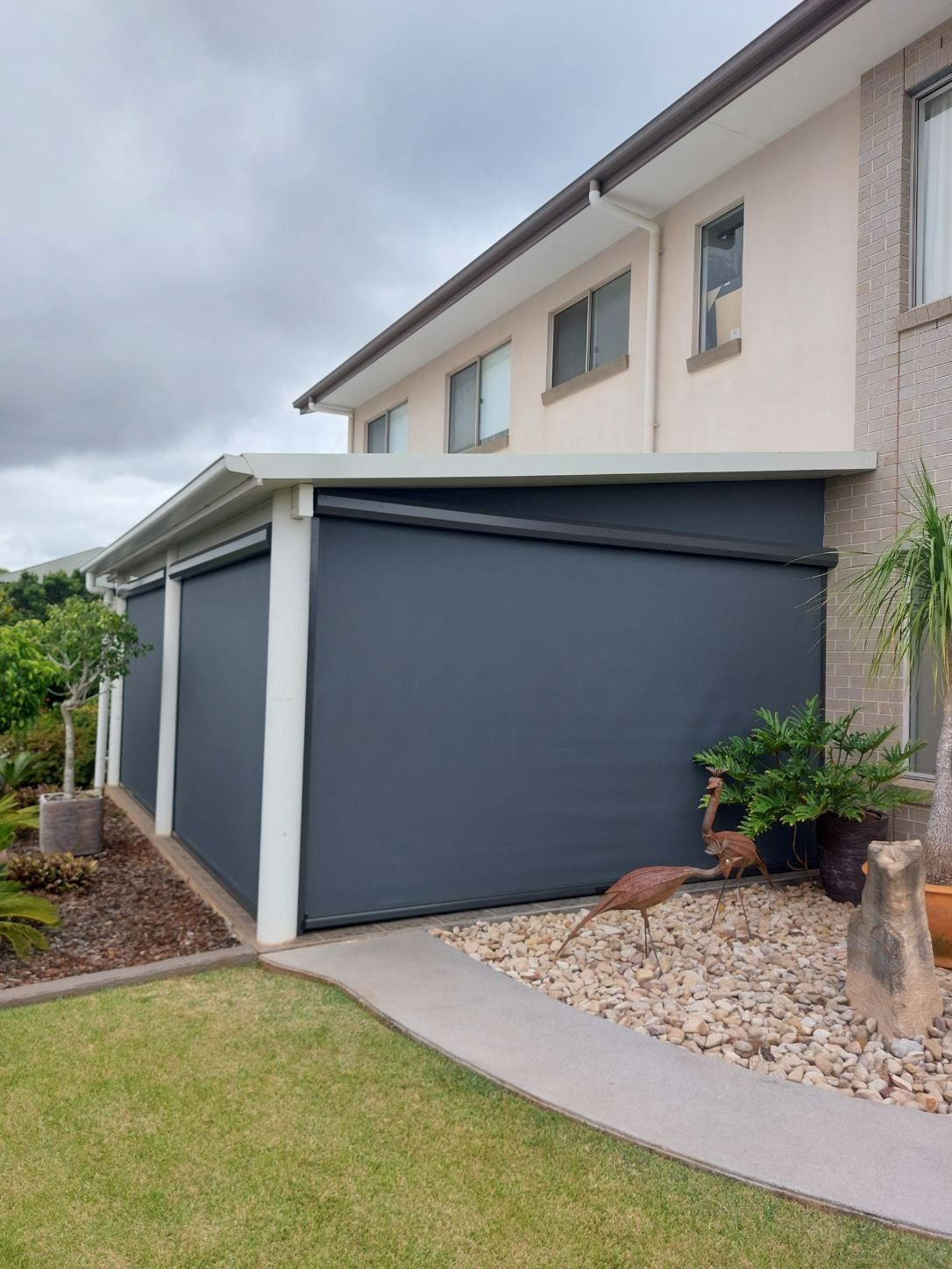 Dark Gray Outdoor Blinds on a Light-colored House — Toowoomba Shade & Canvas in Harristown, QLD