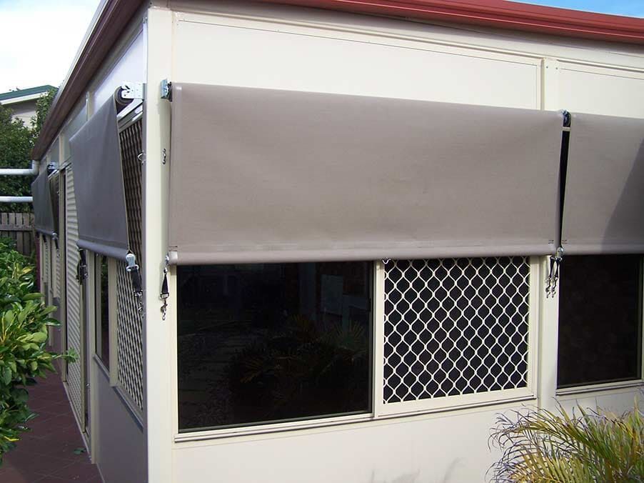 Tan Outdoor Blinds Installed on Windows — Toowoomba Shade & Canvas in Harristown, QLD