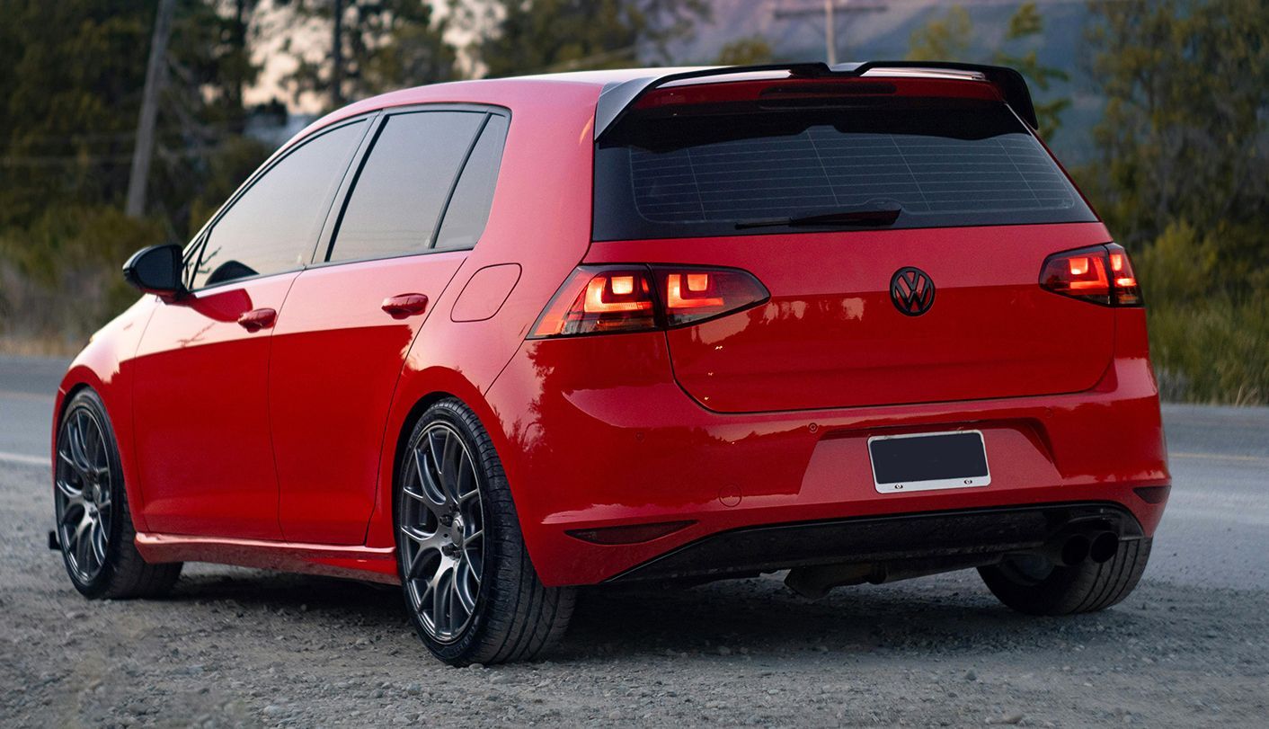 A Row Of Black Cars Are Parked In A Parking Lot — Dunhams Auto Repairs In Woonona, NSW