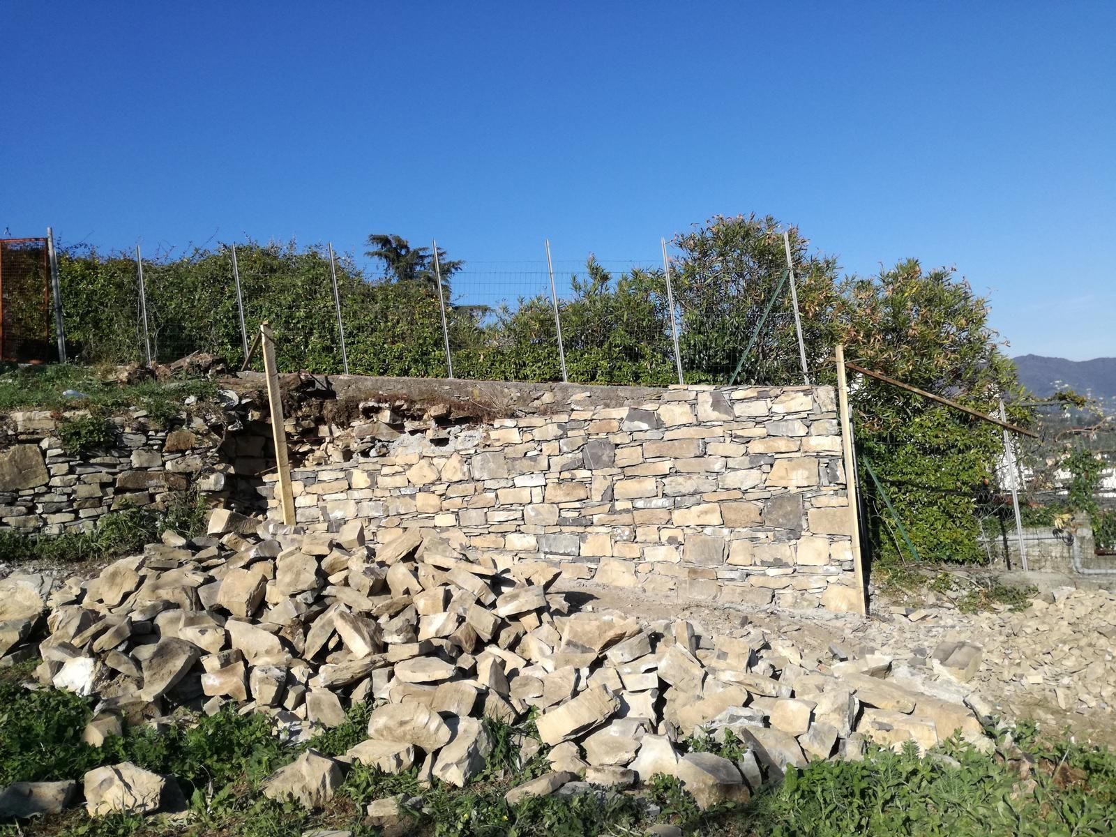 fase muro si contenumento in pietra