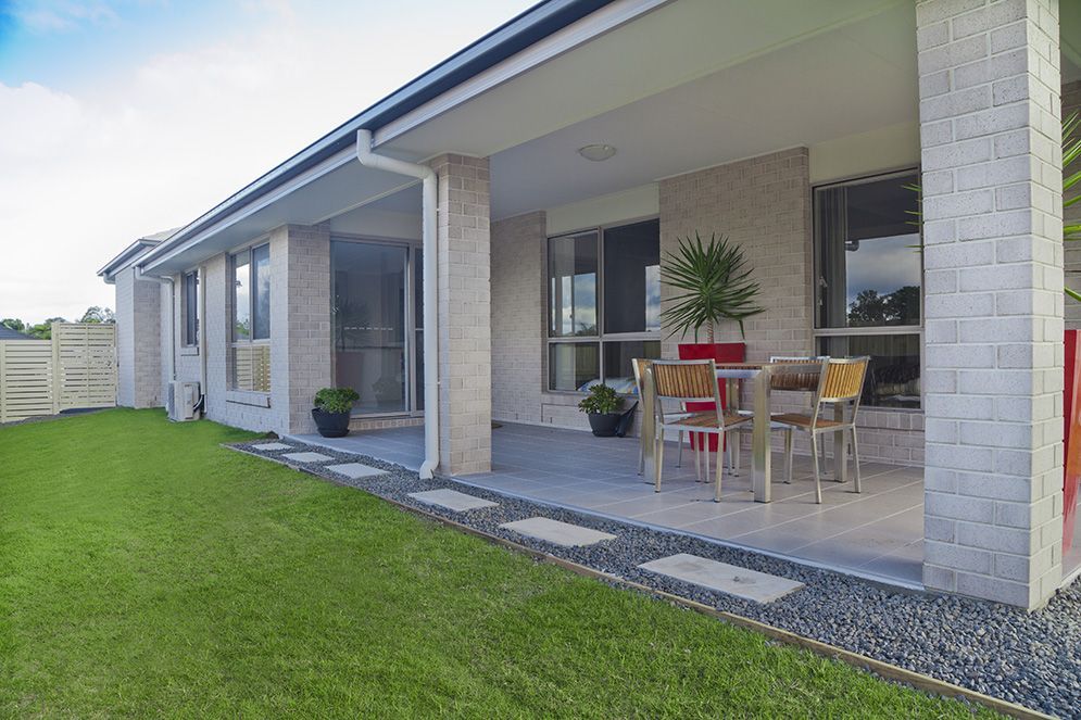 A House With a Patio and a Table and Chairs on It — Highfields Turf in Toowoomba, QLD