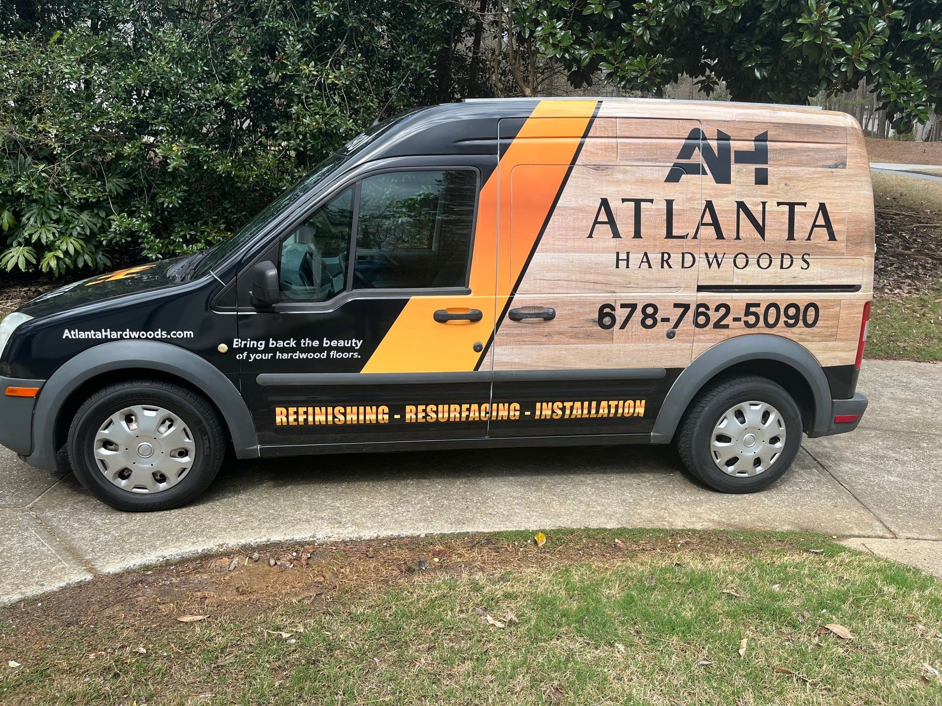 A black van with the word atlanta on the side