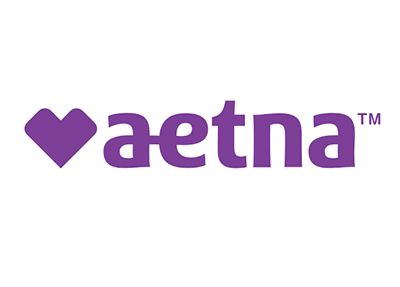 Aetna logo: Purple heart symbol beside the word