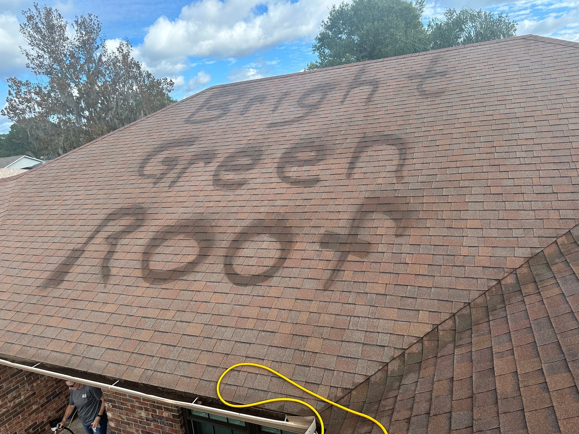 A roof with the words `` green roof '' written on it.