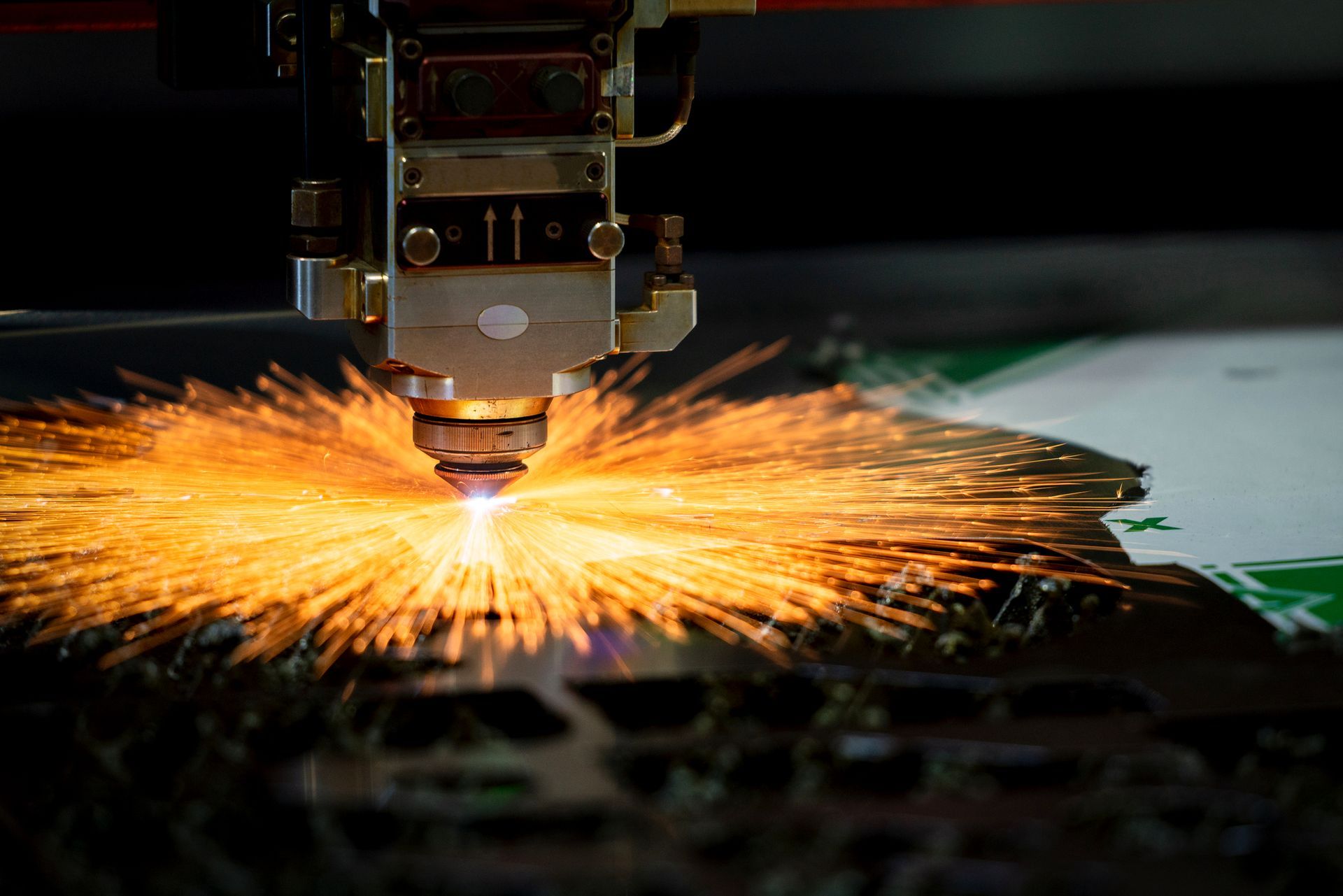 Image of high-tech metal cutting laser tool in operation. - Laser Cutting In Brisbane