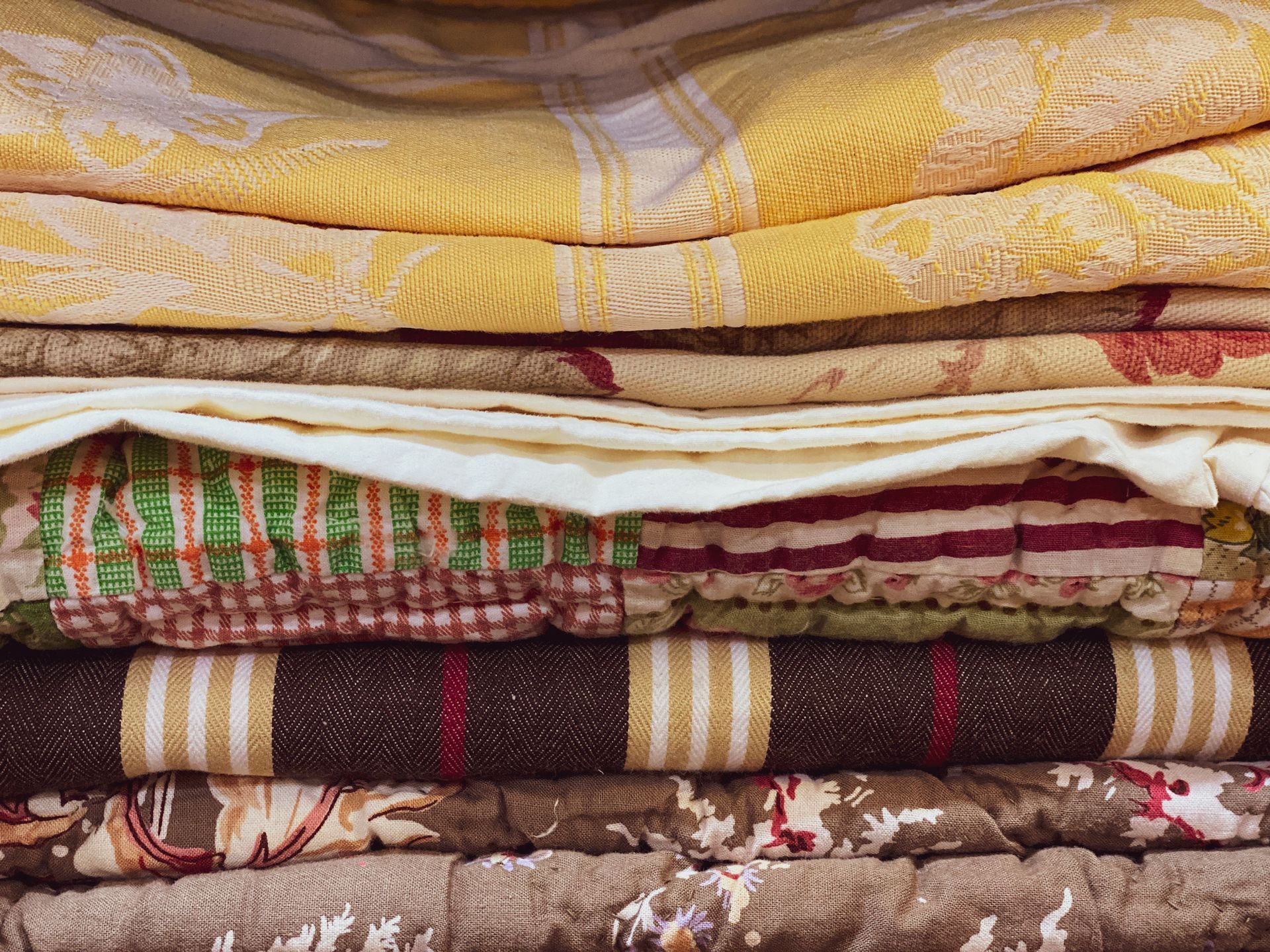 Stack of vintage fabrics. Stack of vintage fabrics.