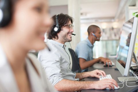 People With Headsets Working at Computers — Wesley Chapel, Fl — DigitalBrainz
