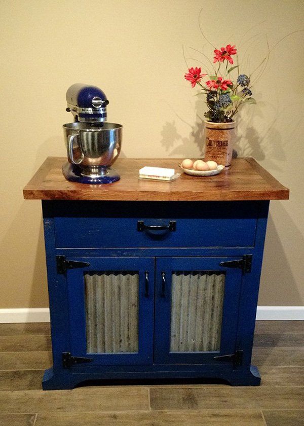 blue sideboard with tin front