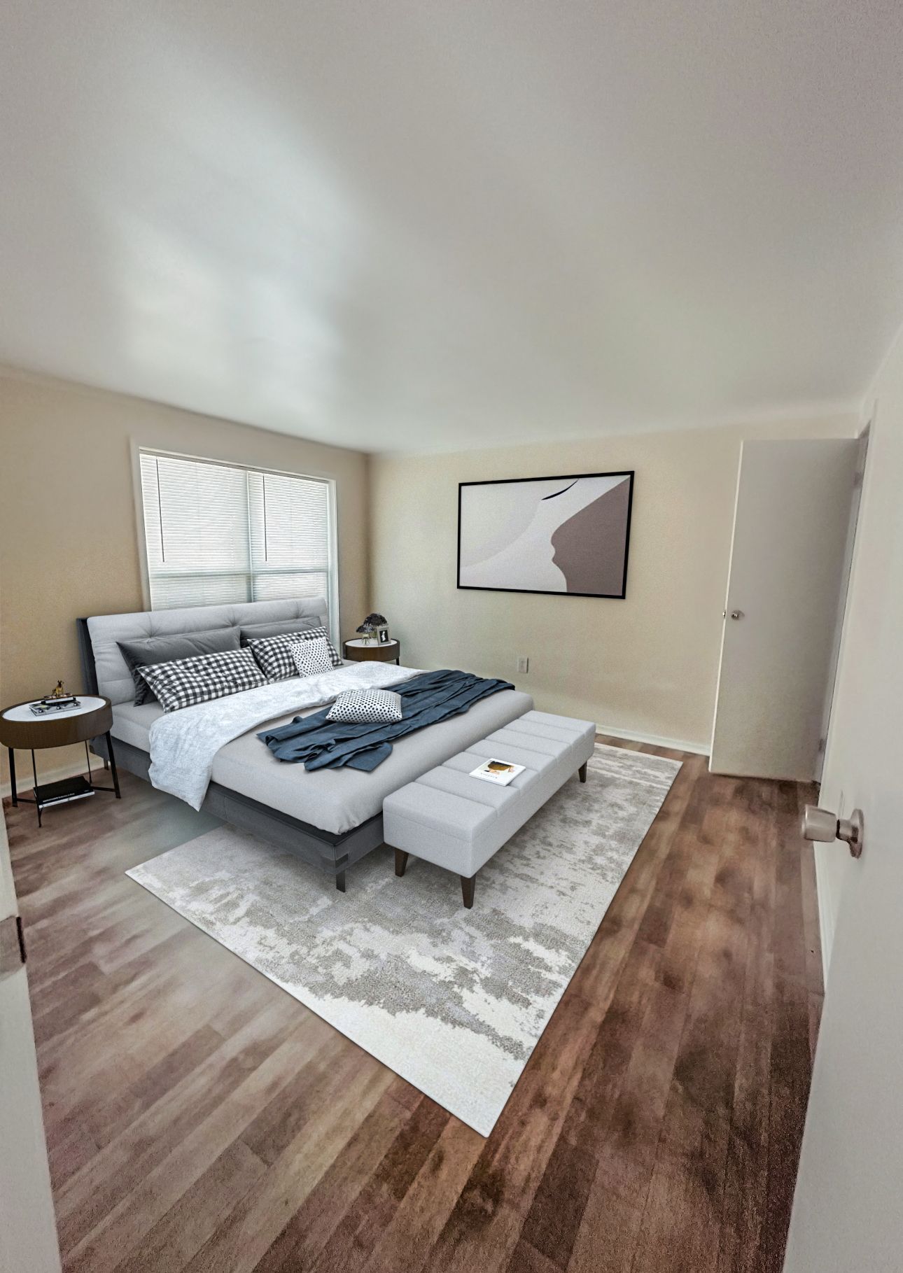 Photo of a bedroom, showing plenty of open space and natural light