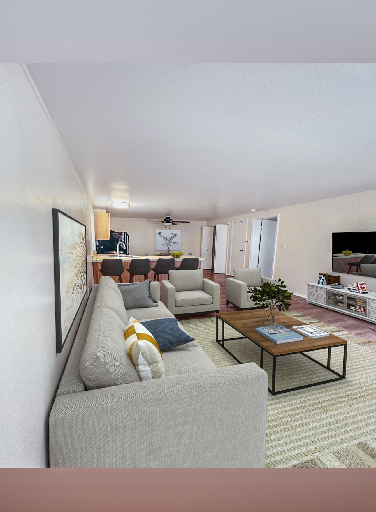 Photo of a living room, with a couch, table and television