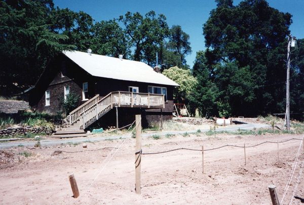 A house with stairs leading up to the second floor