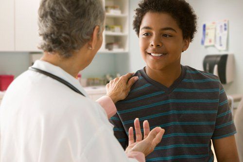 a doctor talking to a patient