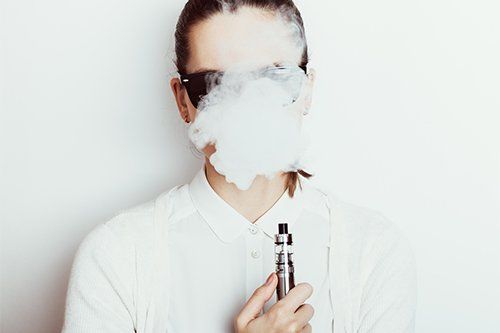 Woman Using Electronic Cigarette