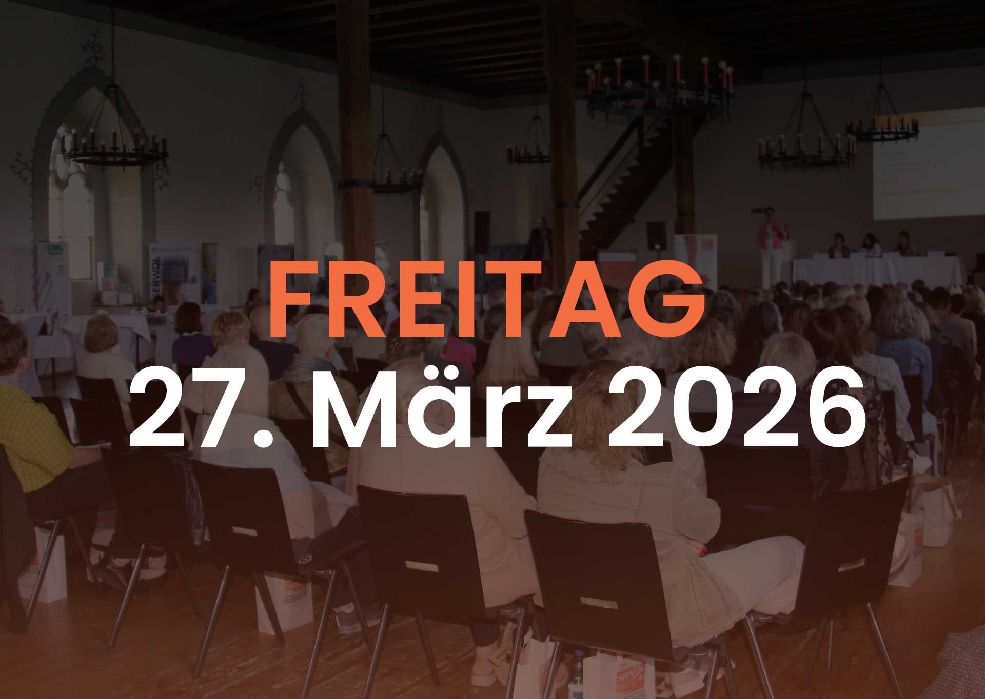 Event with attendees in a large hall on Friday, March 27, 2026.