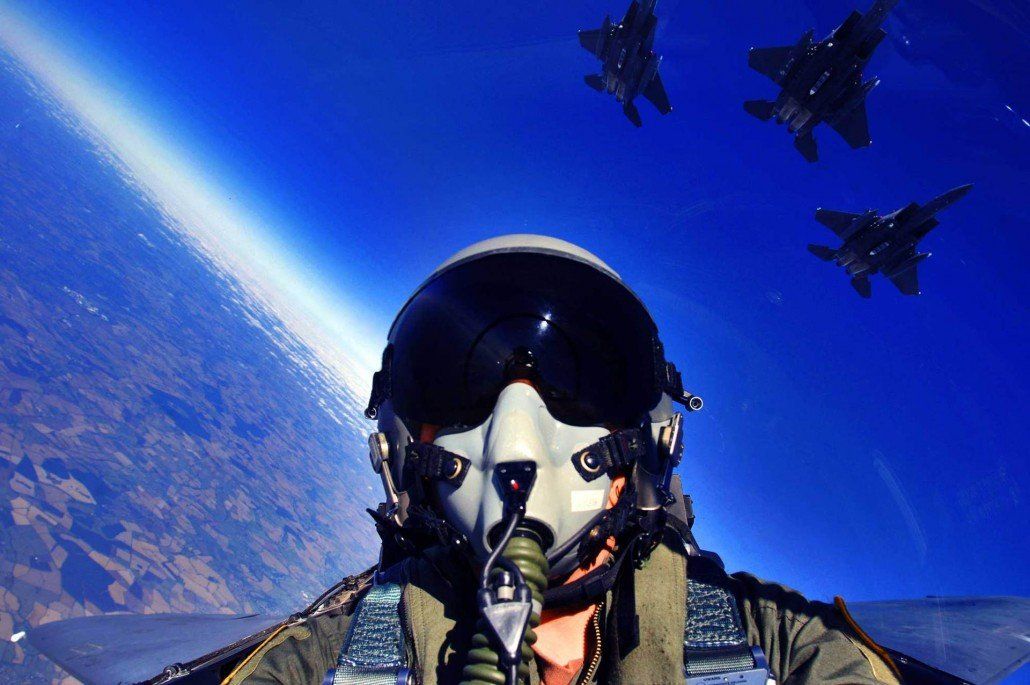 A real F-16 pilot with blue sky background