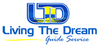 the logo for living the dream guide service is blue and yellow .