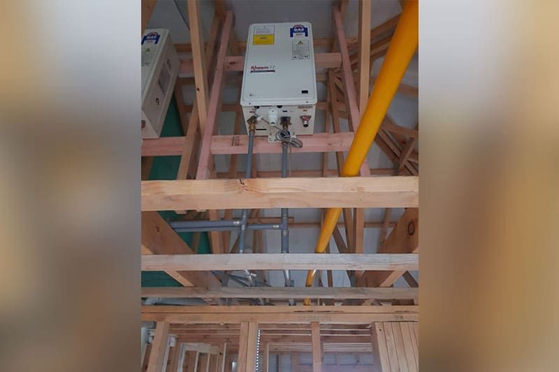 Wooden Support With A Water Heater On Top – Hamilton, NZ – Jamark Plumbing