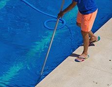 Vacation Home Pool Service — Cleaning Pool Floor in South Lake Tahoe, CA