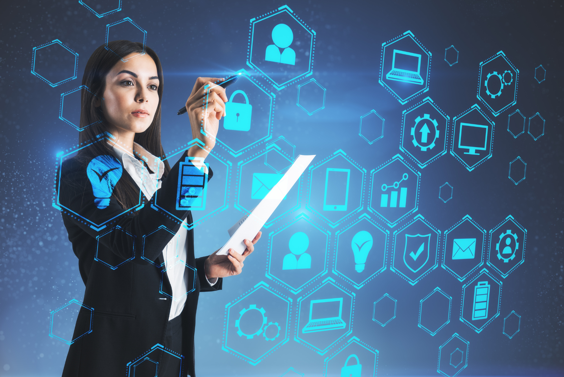 Woman in business suit drawing on digital interface with various icons.