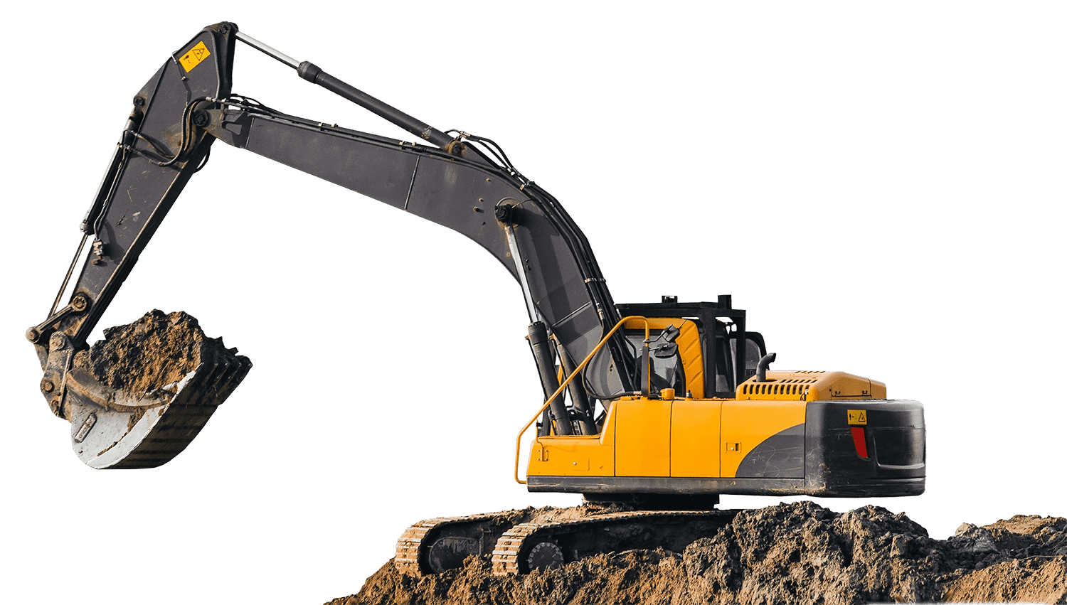 Yellow excavator digging into a dirt pile.