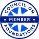 A blue and white logo for the council on foundations