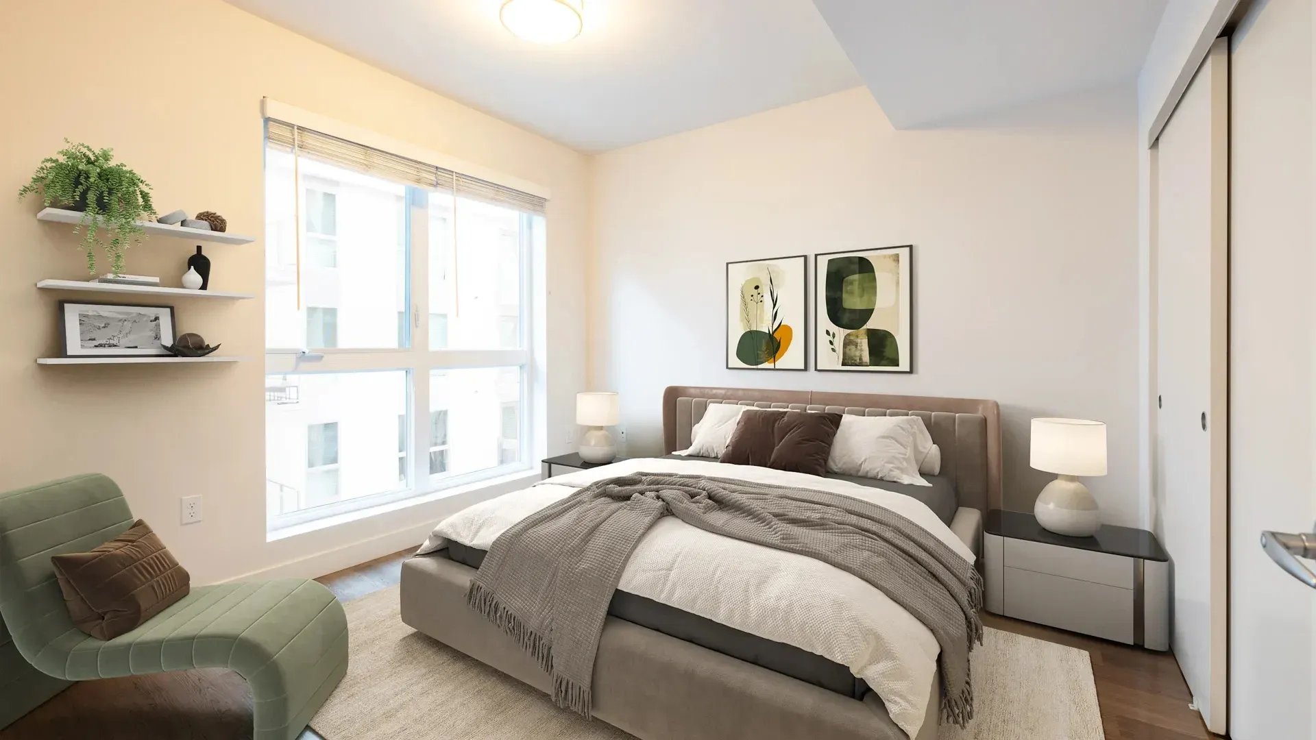 Modern bedroom with a queen-sized bed, plush bedding, and large window.