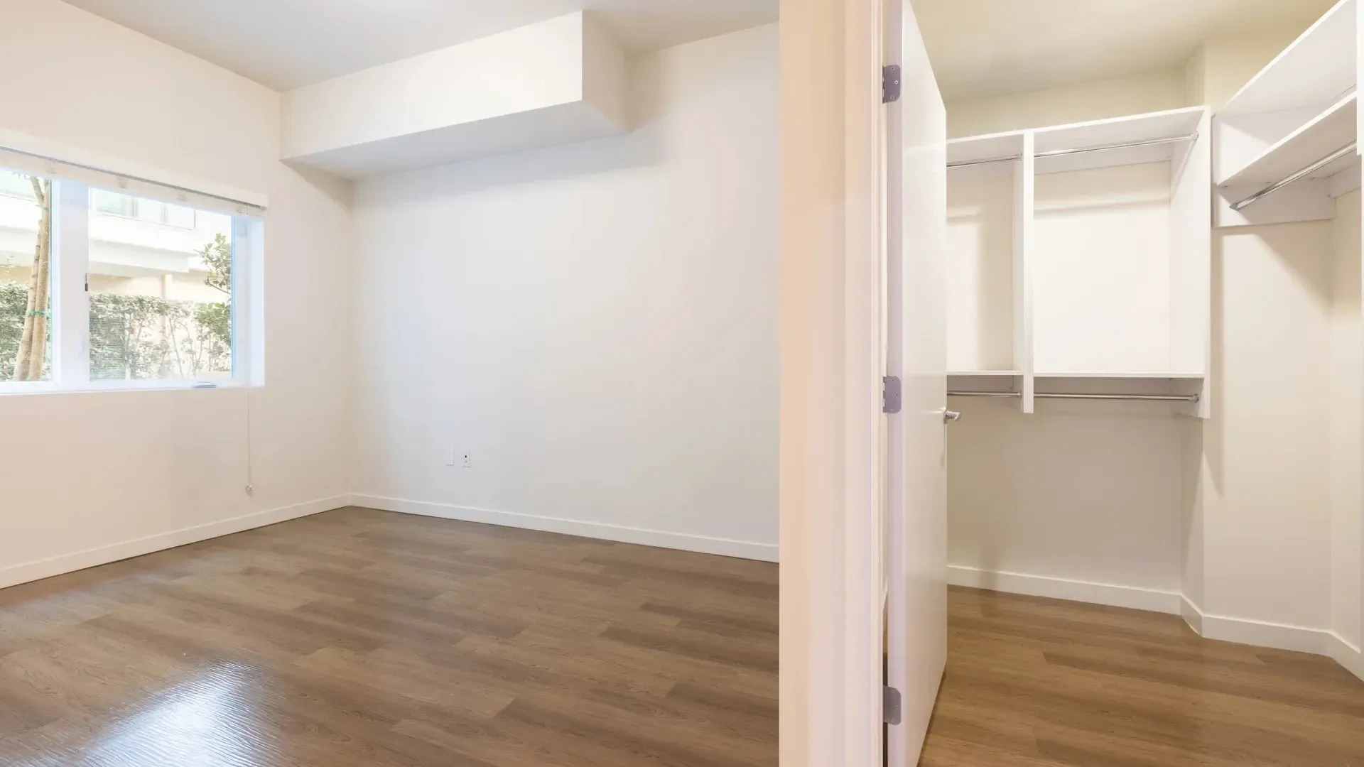 Empty bedroom with large closet