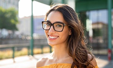 Smiling Woman Wearing Eyeglasses — Washington, PA — Snee Dental Associates