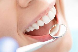 Woman having her Teeth Examined - Dentists in Washington, PA