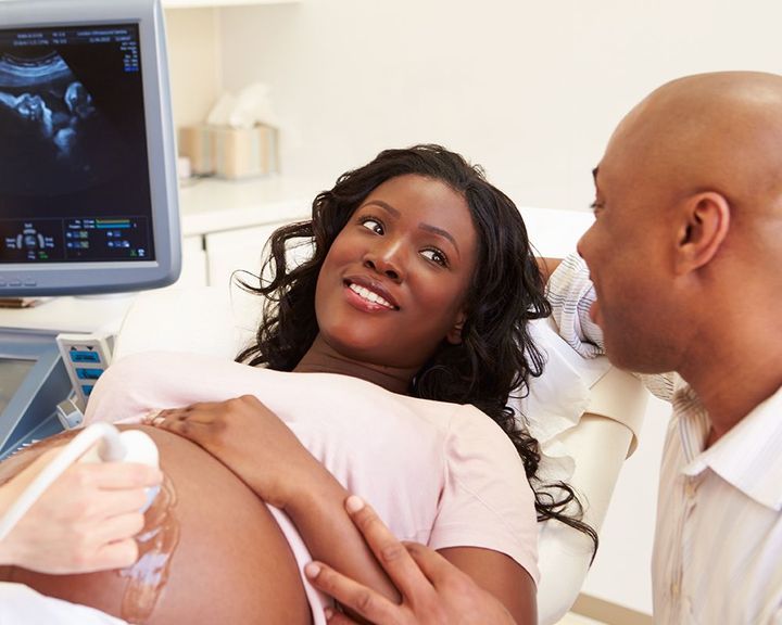 Pregnant Woman is Laid in a Hospital Bed