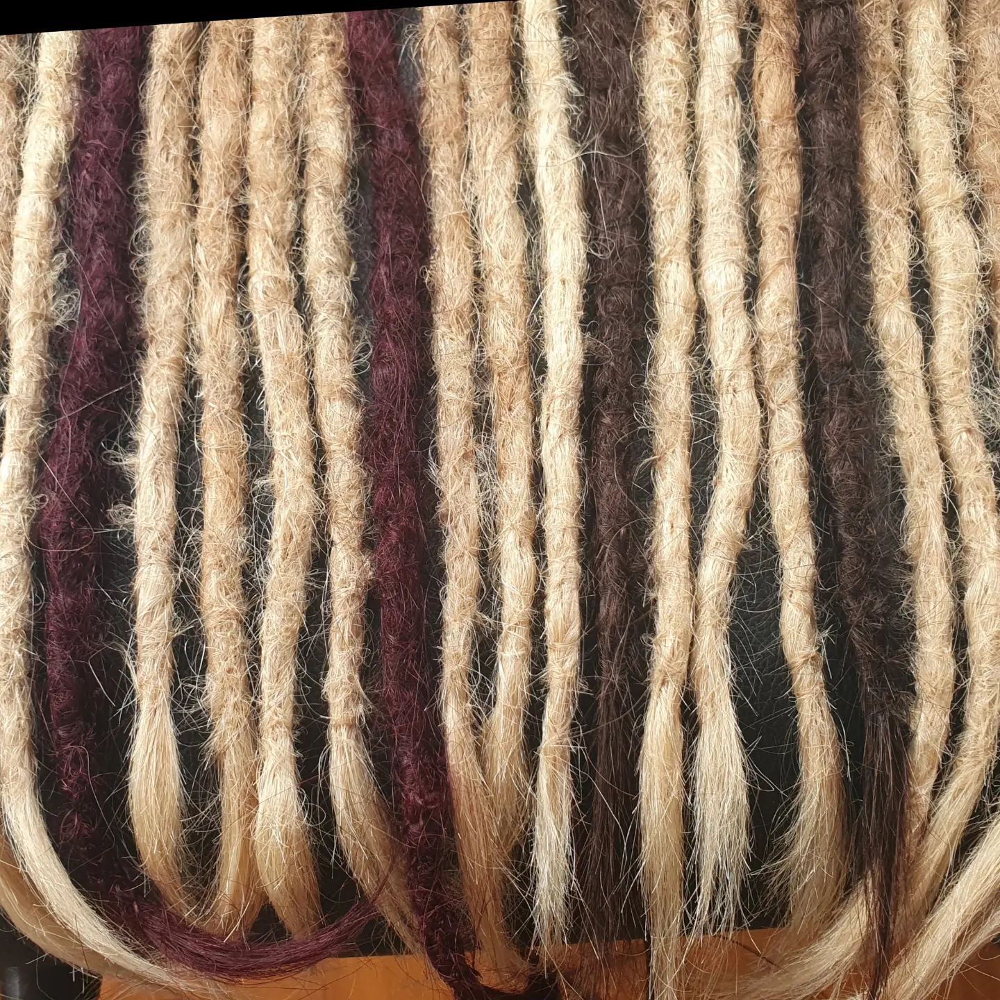 Hand made real hair dreadlock extenions, blonde and burgundy