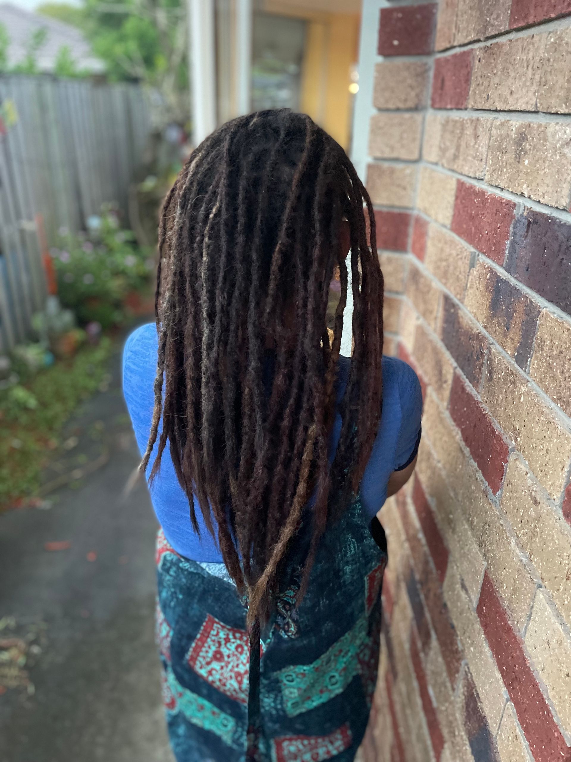 New set of dark haired dreadlocks with synthetic extensions