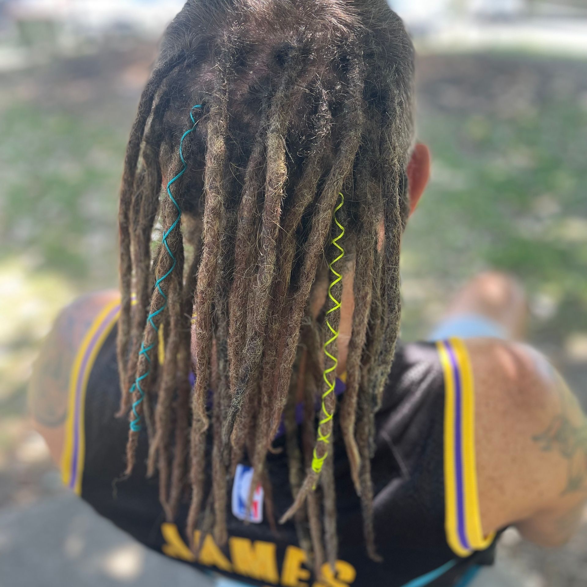 dreaded mullet, coloured dread wraps, tapered dread ends, unique style, drullet