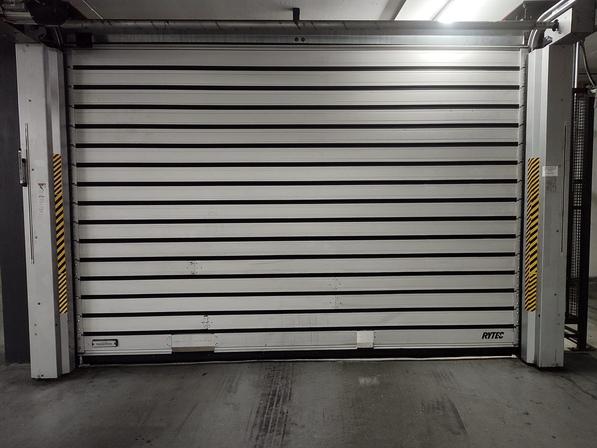 A garage door with the word bec on it