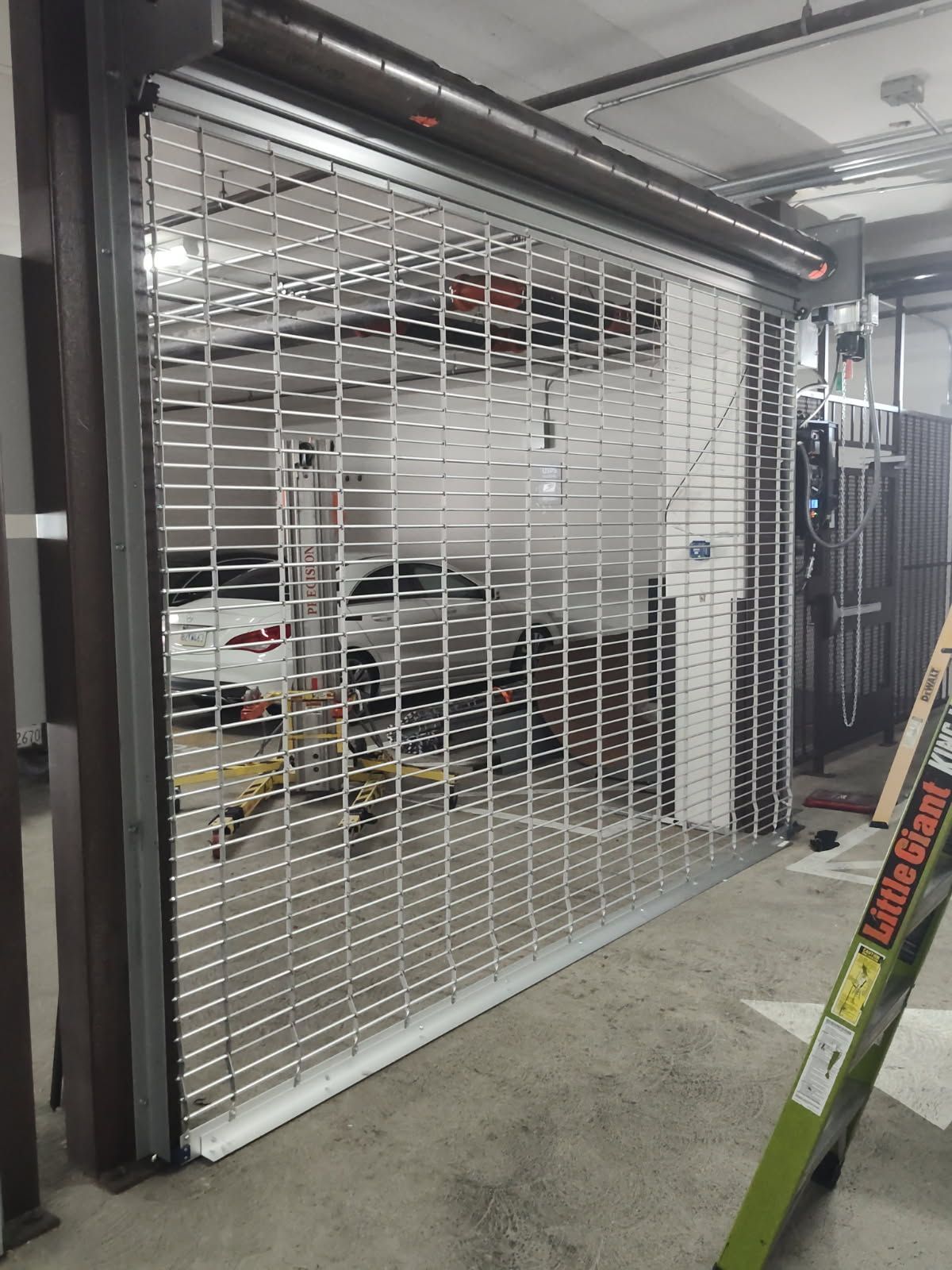 A man wearing a black shirt that says ' move ' on the back