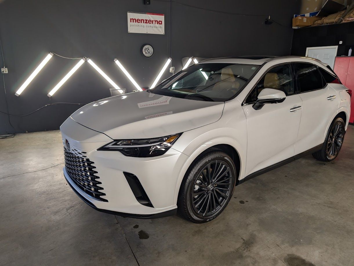 Luxury SUV protected with Owner’s Pride ceramic coating, featuring a permanent wet-look shine in Newnan.