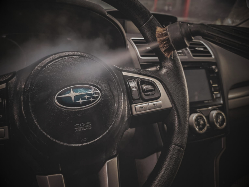 Professional interior steam cleaning and sanitization for a vehicle in Newnan, GA by Shine Again Auto Detailing.