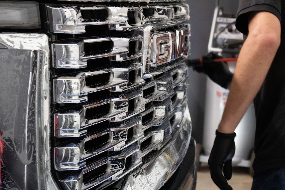 Premium auto detailing service on a car exterior in Newnan, GA