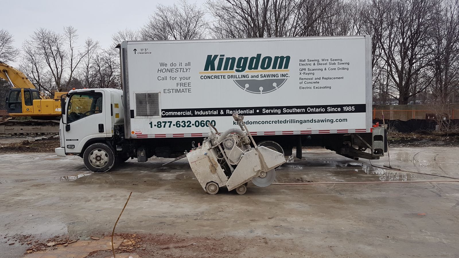 A white truck with the word kingdom on it