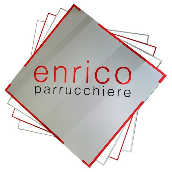 Enrico Parrucchiere logo