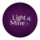 A purple and gold logo for Light of Mine LLC Energy Healing in Denver