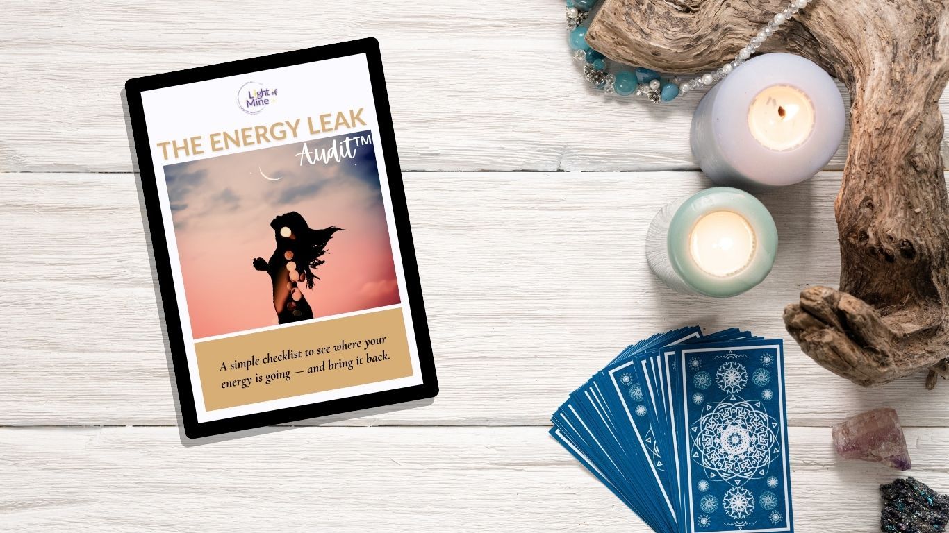 in ebook on an iphone with candles and tarot cards